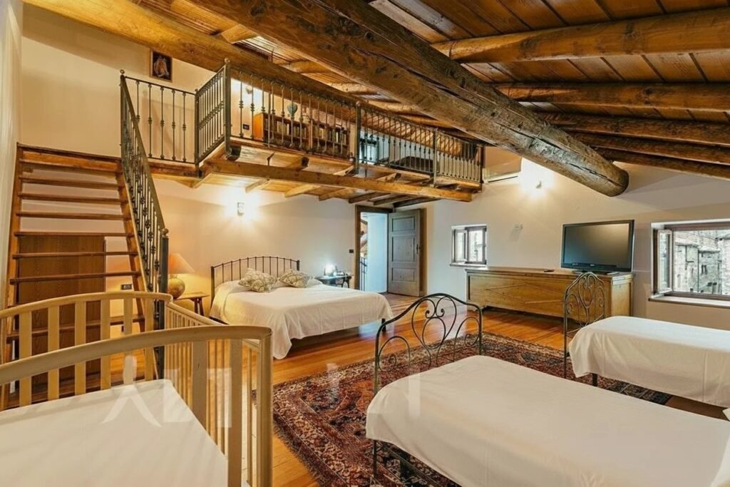 A PANORAMIC ALPINE RETREAT – EXCLUSIVE VILLA WITH POOL AND VINEYARDS IN VALTELLINA image 22