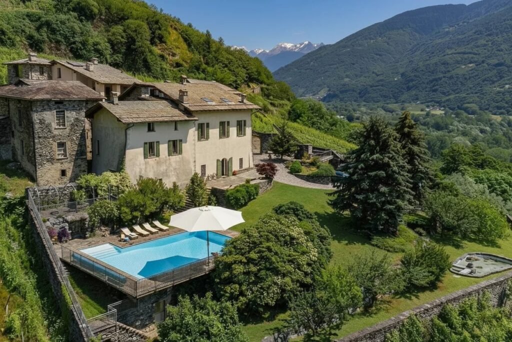 A PANORAMIC ALPINE RETREAT – EXCLUSIVE VILLA WITH POOL AND VINEYARDS IN VALTELLINA image 9